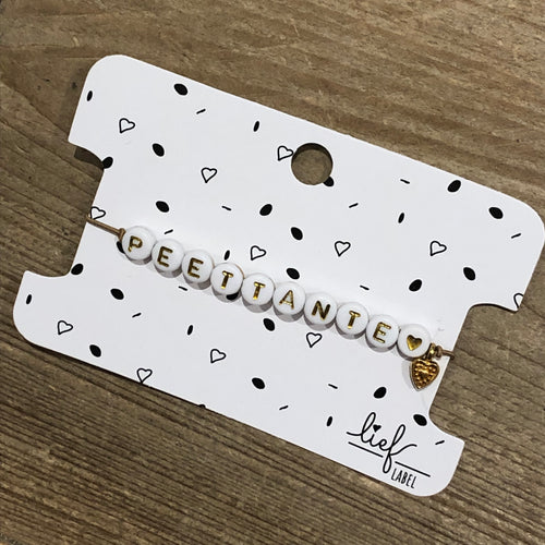 Armbandje Peettante Beige wit met bedeltje