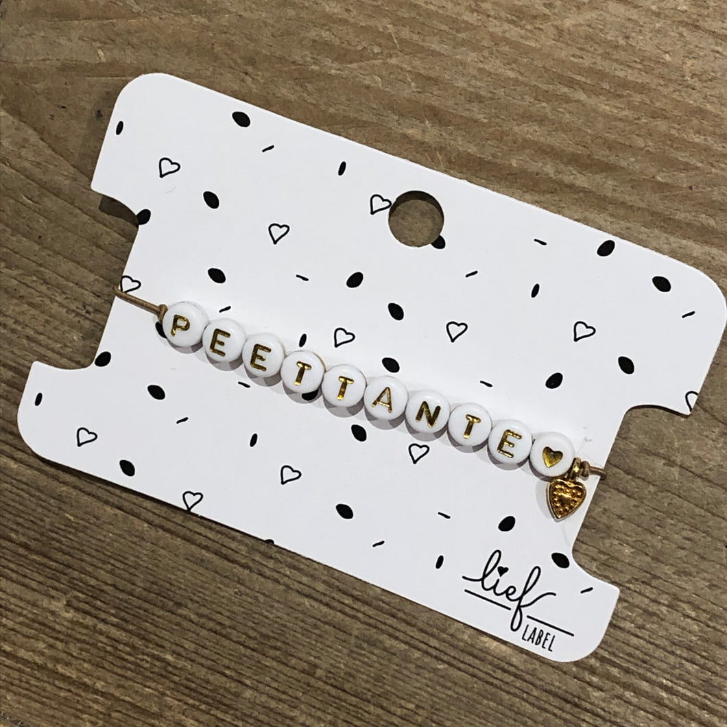 Armbandje Peettante Beige wit met bedeltje